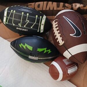 A Group of 4 Footballs sell as 1 piece